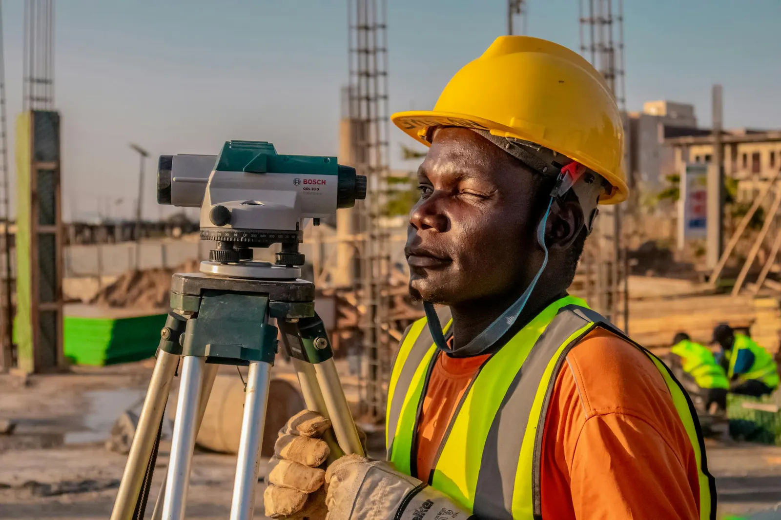 GeoGiza surveyor occupying a control point with a tripod-mounted instrument during a field accuracy check